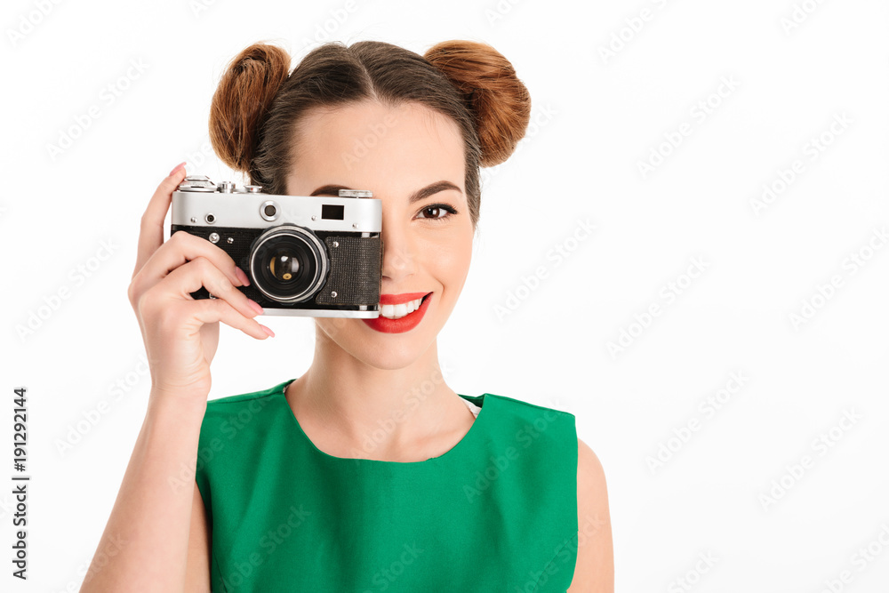 Portrait of a smiling young girl dressed in green dress Portrait of a smiling young girl dressed in green dress