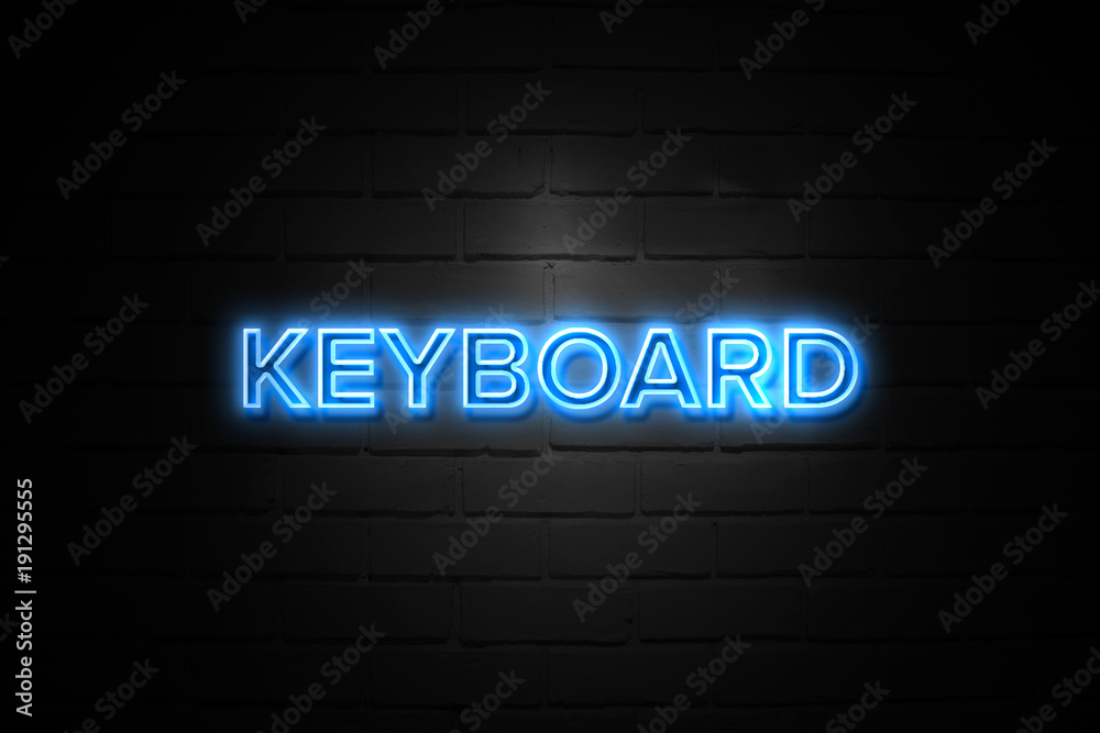 Keyboard neon Sign on brickwall Keyboard neon Sign on brickwall