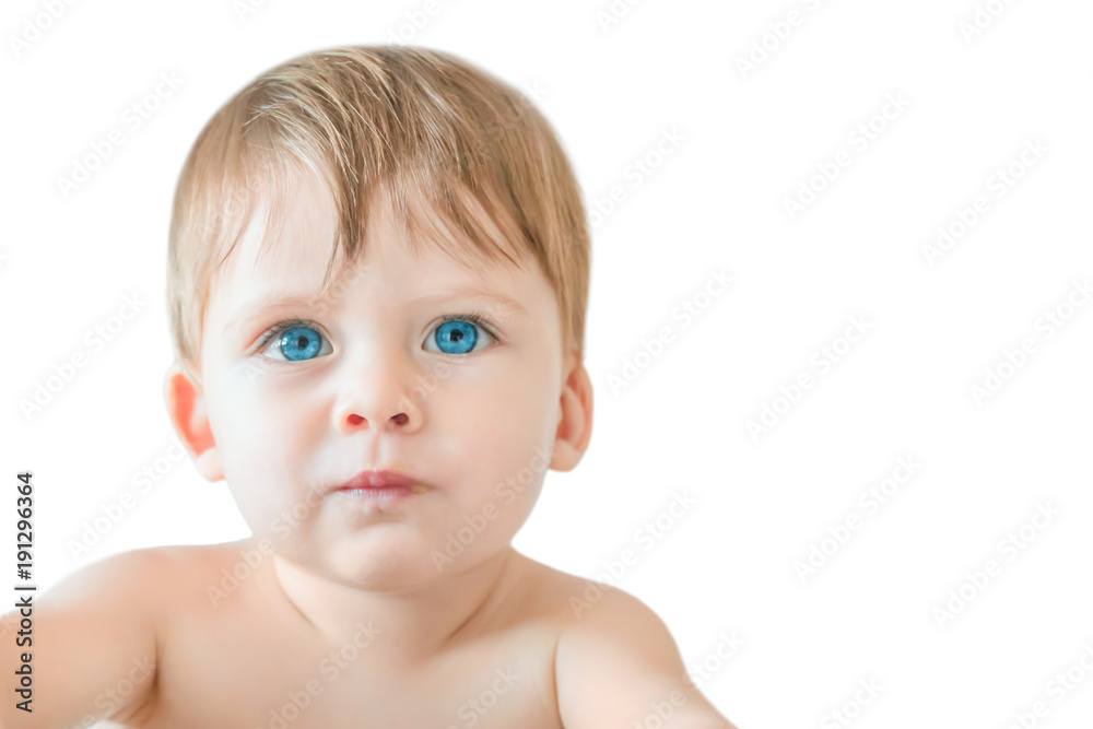 Portrait of a blonde baby boy with blue eyes on a white background. Isolated Portrait of a blonde baby boy with blue eyes on a white background. Isolated