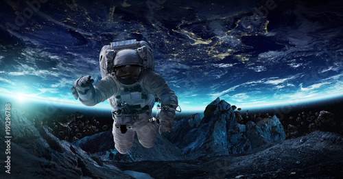 Fototapeta Naklejka Na Ścianę i Meble -  Astronaut floating in space 3D rendering elements of this image furnished by NASA