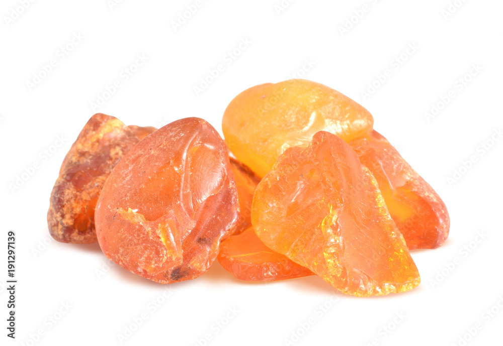 Amber unpolished closed up isolated on white Amber unpolished closed up isolated on white