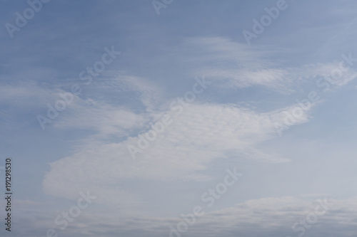 Light blue sky with clouds - abstract background . © baon
