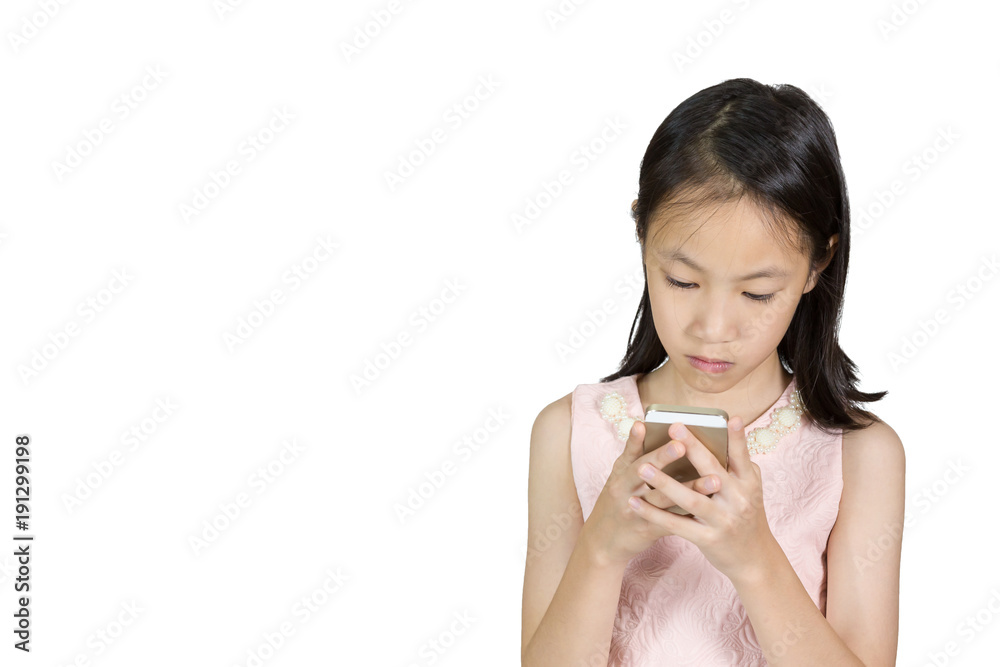 Asian girl is using a mobile phone isolated on white background Asian girl is using a mobile phone isolated on white background