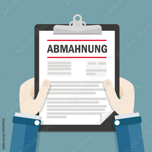 Hände mit einer Abmahnung