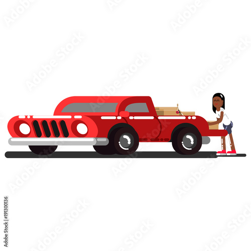Black girl loads boxes into the pick up truck
