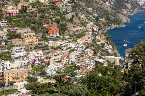 Colourful Positano, the jewel of the Amalfi Coast, with its multicoloured homes and buildings perched on a large hill overlooking the sea. Italy © wjarek