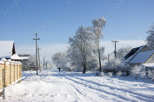 Winter street in the snow, a sunny winter day, at home