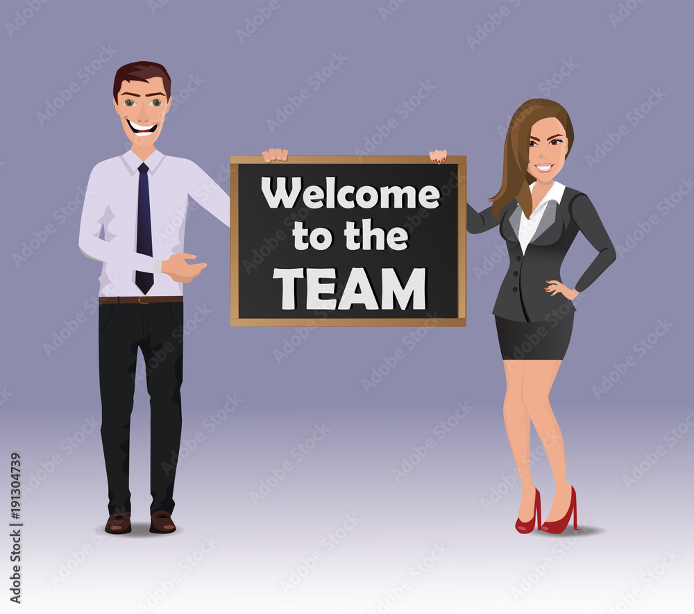 Funny Guy in casual business clothes with beautiful woman in business clothes with chalkboard with text Welcome to the team Funny Guy in casual business clothes with beautiful woman in business clothes with chalkboard with text Welcome to the team