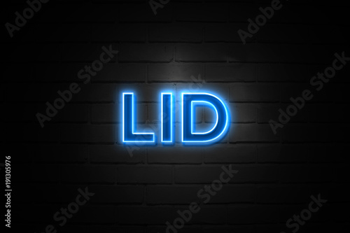 Lid neon Sign on brickwall