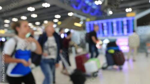 Wallpaper Mural Abstract blur view of commuter crowd of people and passenger walk in the airport terminal, Blurred busy Airport Terminal footage concept. Torontodigital.ca