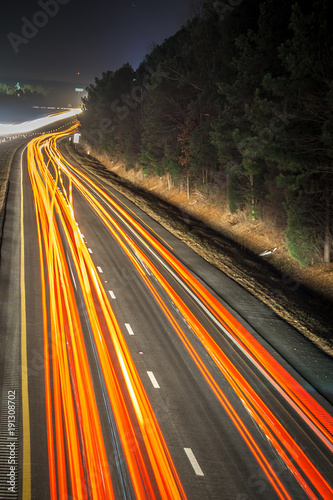 фотографія super highway with high volume of cars at night