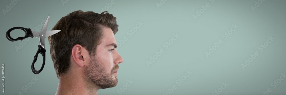 Fototapeta premium Scissors cutting man's hair