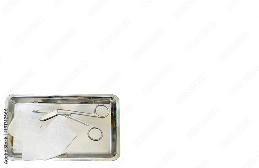 dressing wound set ,scissors ,pad gauze,tray bird eye view on white background with copy text space