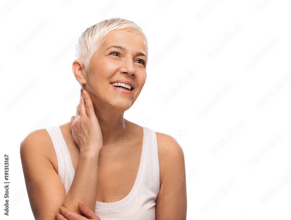 Portrait of a beautiful elderly woman, smiling, isolated on white background Portrait of a beautiful elderly woman, smiling, isolated on white background
