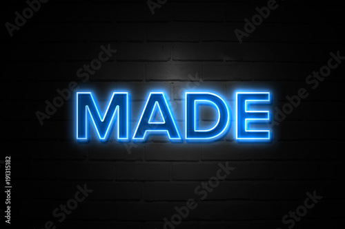 Made neon Sign on brickwall