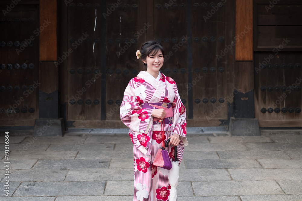 Attractive asian woman wearing kimono at Asakusa, Tokyo, Japan Attractive asian woman wearing kimono at Asakusa, Tokyo, Japan