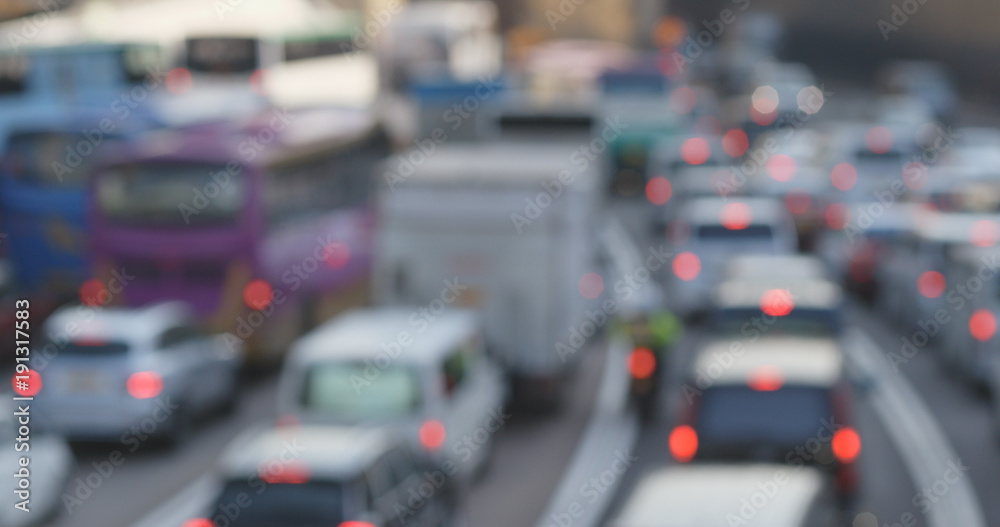 Fototapeta premium Blur view of traffic in city, traffic jam at outdoor