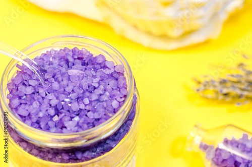 Aroma sea spa cosmetics salt lavender extract bath natural mineral treatment dried lavender view close up concept ultra violer color trend year purple yellow background