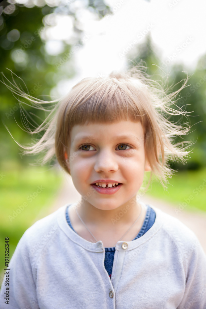 portrait of girl in summer park. portrait of girl in summer park.