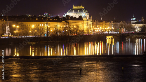 The night View on the Prague National Theater above the River Vltava, Czech Republic