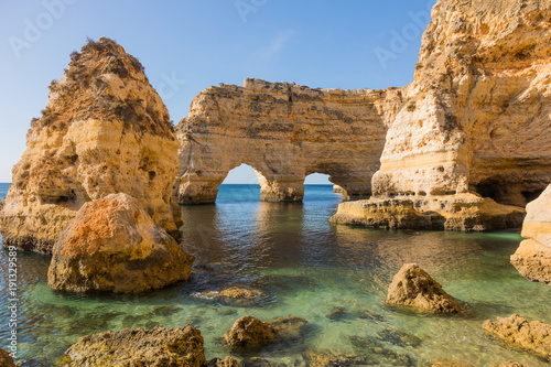 Natural caves at Marinha beach, Algarve Portugal photo