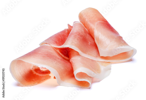 Italian prosciutto crudo or spanish jamon. Raw ham on white background. photo