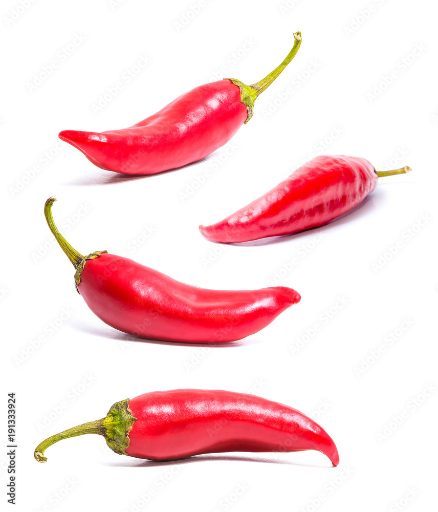 Set of four isolated on white red hot peppers. Acute spice for food. Healthy food. Bright colors. Set of four isolated on white red hot peppers. Acute spice for food. Healthy food. Bright colors.