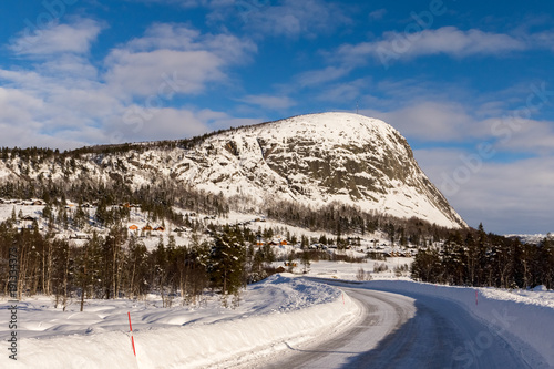 Mountain road in winter, at Loefjell mountain in Setesdal, Norway photo