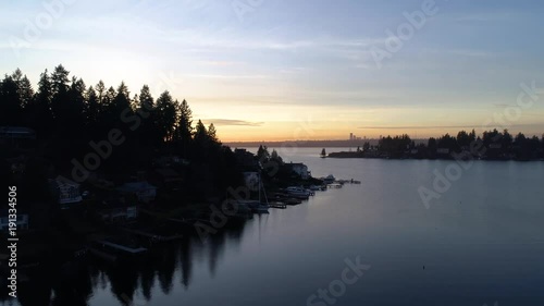 Bellevue Washington Lake Sunset Overlooking Seattle City Skyline Beautiful Amazing Sun Rays - Northwest Aerial View photo