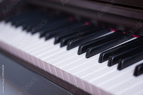 Close up of wooden brown piano keys