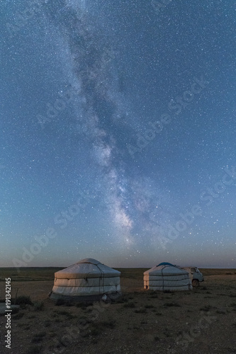 Mongolian traditional gers under the Milky Way, Ulziit, Middle Gobi province, Mongolia photo