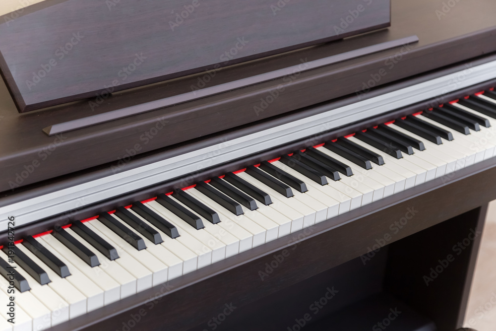 modern wooden black piano in music classrom modern wooden black piano in music classrom