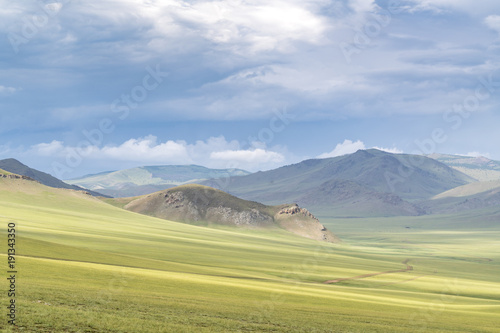 Landscape of the green Mongolian steppe under a gloomy sky, Ovorkhangai province, Mongolia