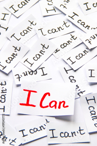 I can. Words of motivation. Concept motivational message of ability and possibility. I can`t and i can are written on peaces of white paper.