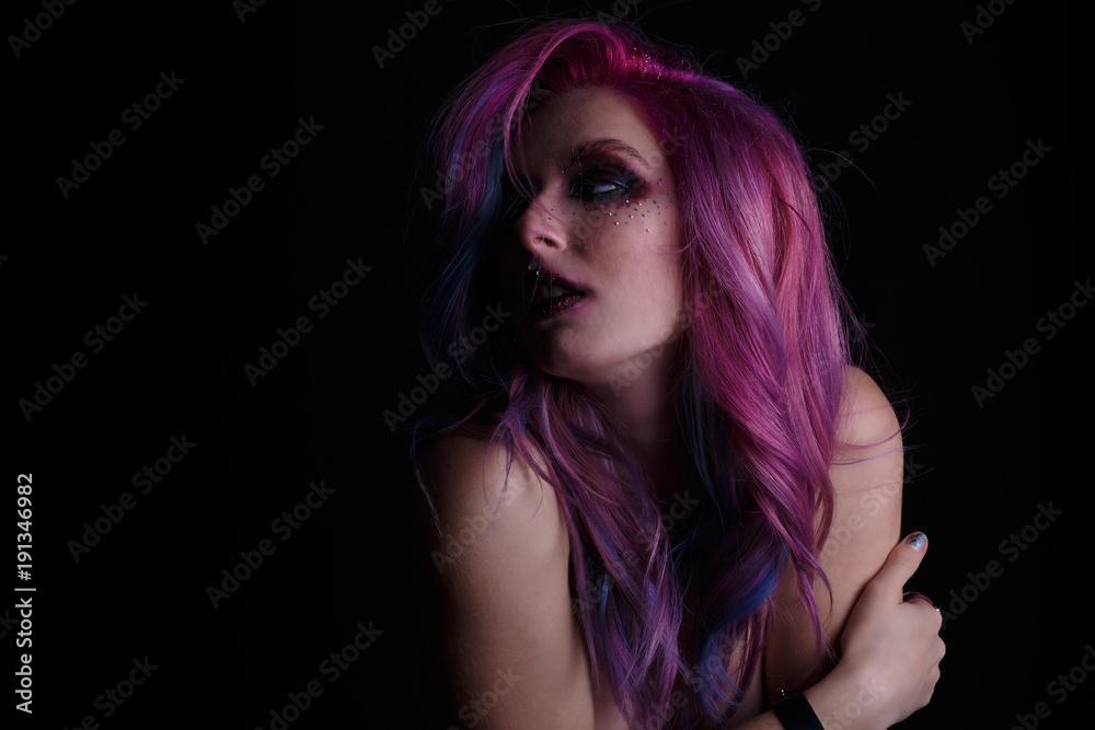 Crazy Colored young girl posing in studio Crazy Colored young girl posing in studio