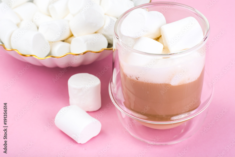 White marshmallow on pink background
