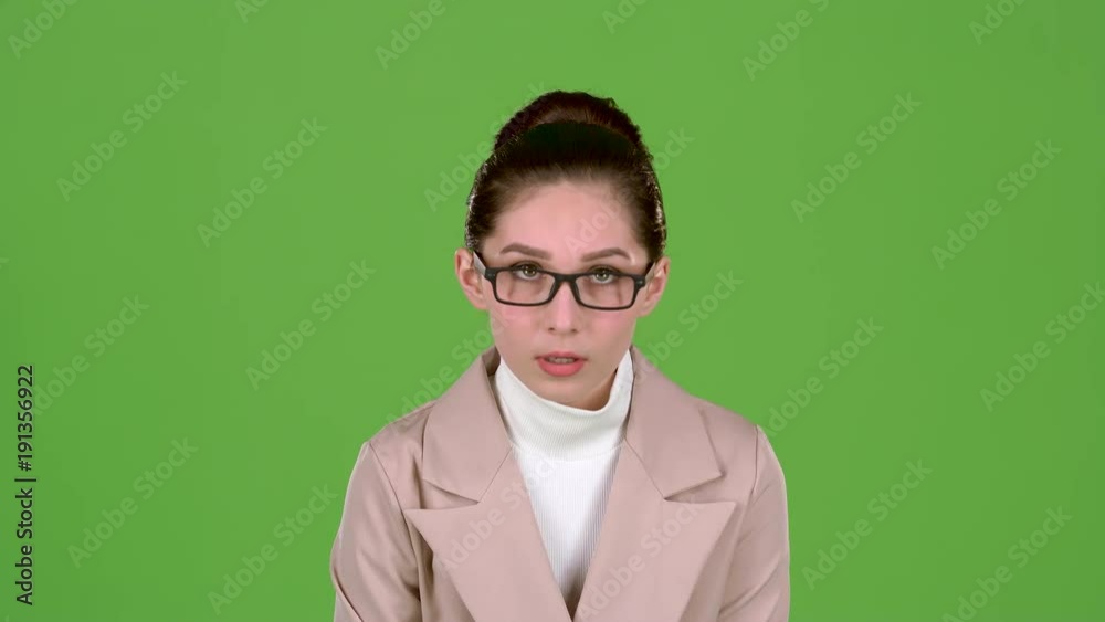 Headmaster makes the girl at the meeting, she is tired. Green screen. Slow motion Headmaster makes the girl at the meeting, she is tired. Green screen. Slow motion