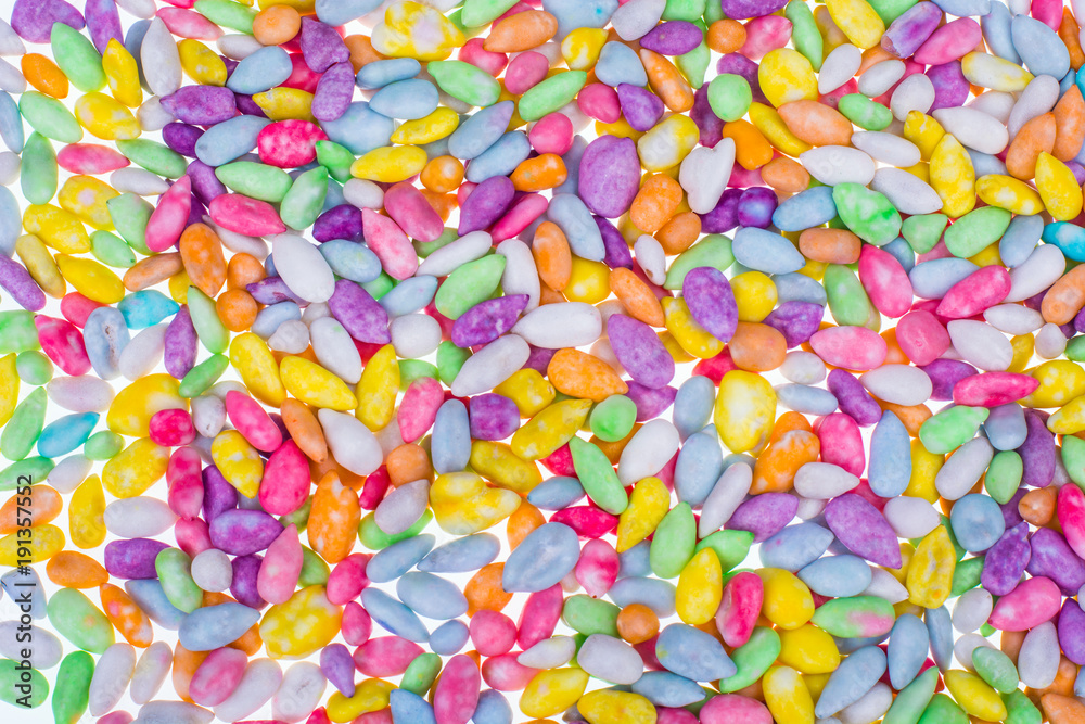 Background, texture of multi-colored small sweet dragees