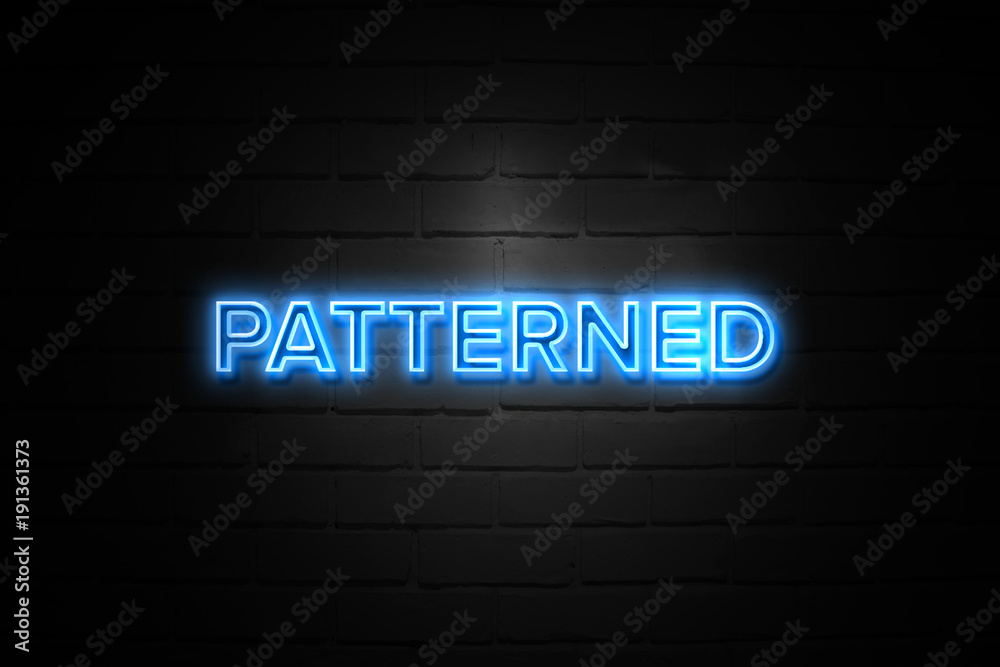 Patterned neon Sign on brickwall Patterned neon Sign on brickwall