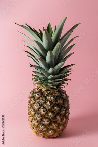 Pineapple on pink background.
