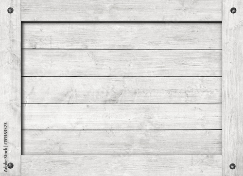 Side of old gray wooden crate, box, planks or frame with screws for text or message