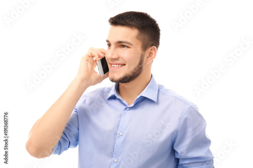 Young man talking on cell p...