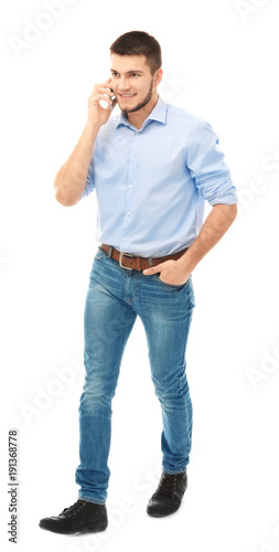 Young man talking on cell p...