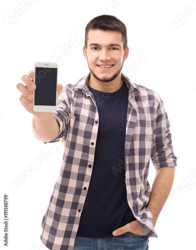 Young man with cell phone o...