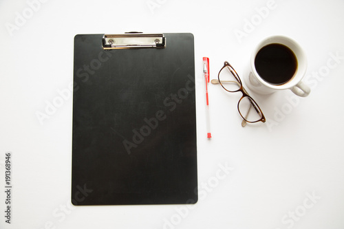 Clipboard  glasses  pens and coffee