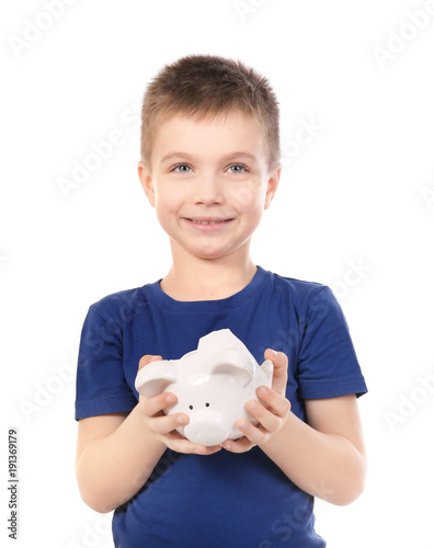Cute boy holding broken pig...