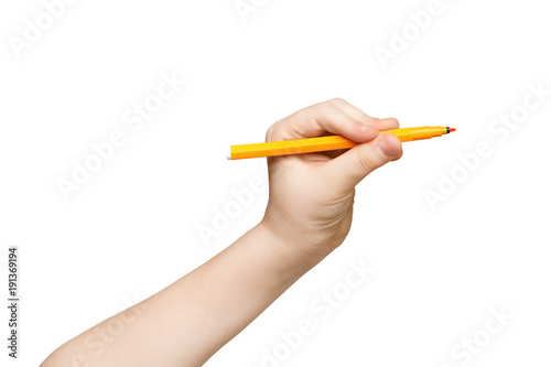 Kid hand holding felt-tip pen isolated on white