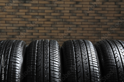 Car tires on blurred background