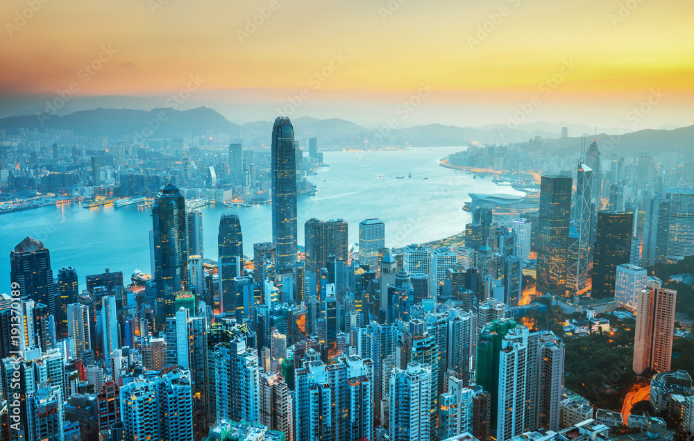 Amazing view on Hong Kong city skyline at sunrise from the Victoria peak, China