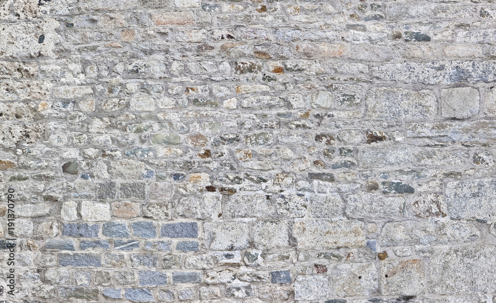 Rustikale Burgmauer im Panoramaformat StockFoto Adobe Stock